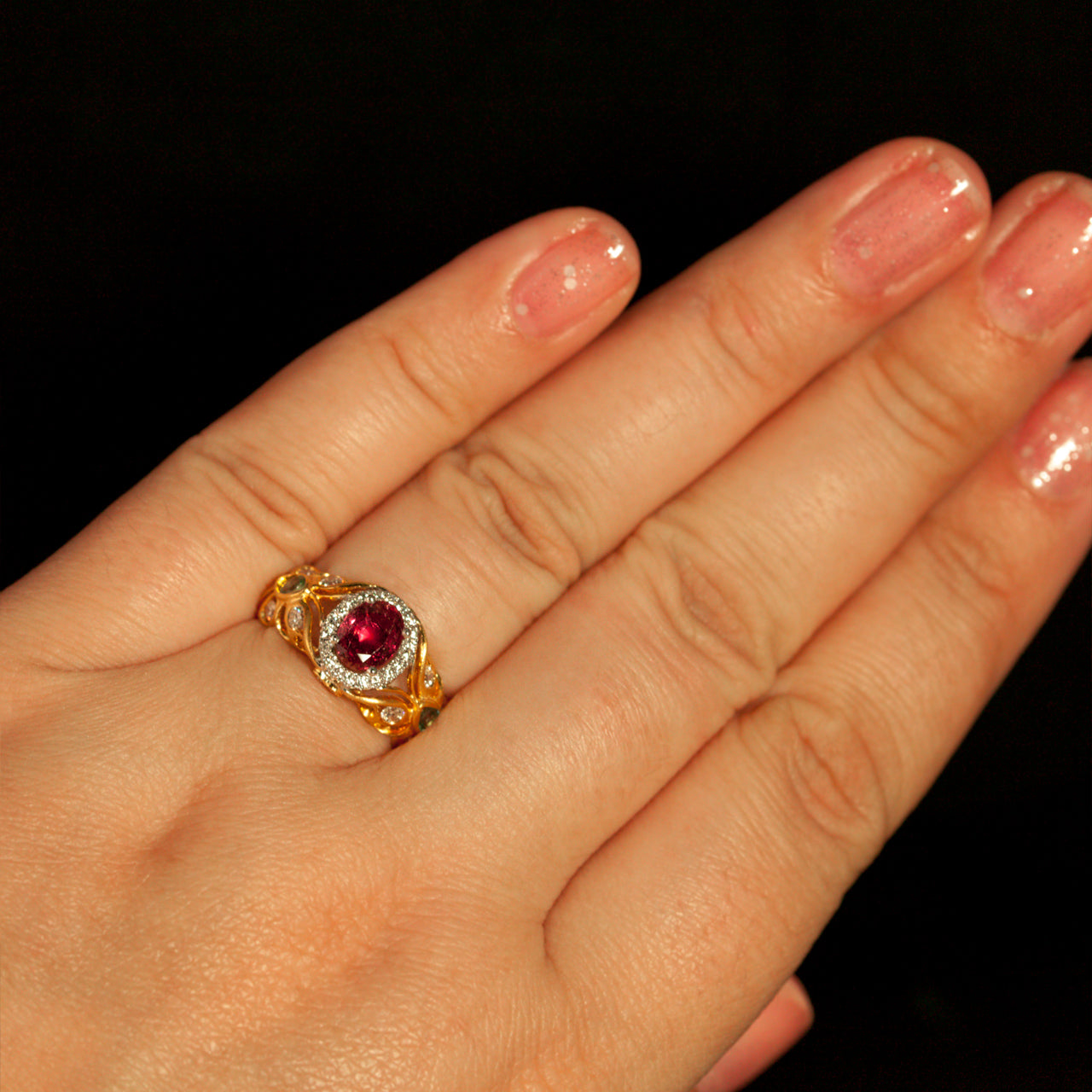 18k two-tone gold ring with 1.03ct natural untreated ruby and alexandrite accents on hand