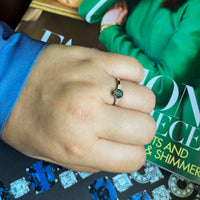 Thumbnail for 0.63ct natural alexandrite platinum ring with oval gemstone and two baguette diamonds on hand