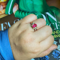 Thumbnail for Natural Ruby and Alexandrite pear-shaped gemstone ring in 18k rose gold with diamond accents on hand