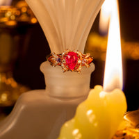 Thumbnail for 18k rose gold ring featuring a pear-shaped natural ruby and two round natural alexandrites with diamond accents