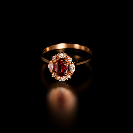 18k yellow gold ring featuring a 0.82ct natural ruby and diamond accents