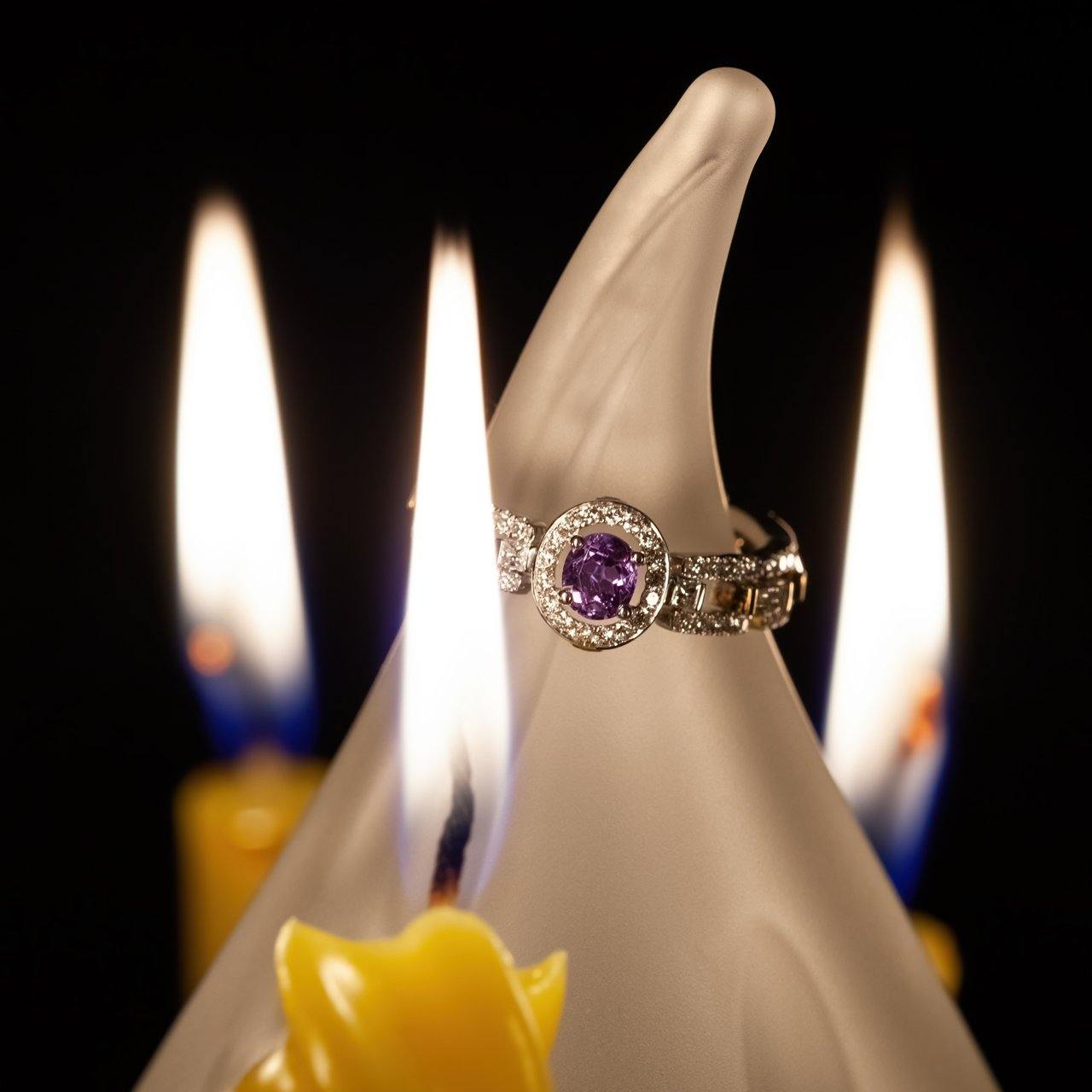 18k gold wedding ring showcasing a 0.40ct alexandrite on a candlelit background