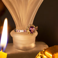 Thumbnail for Pear-shaped natural alexandrite platinum ring with diamond halo and baguette accents in Art Deco design