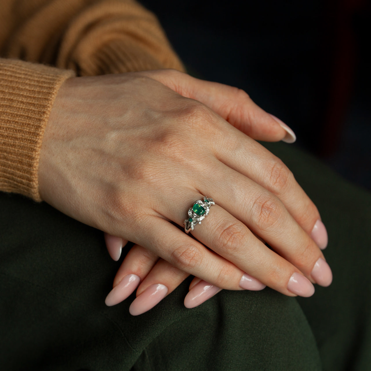 0.65ct natural alexandrite 18k white gold ring with cushion-shaped center stone and diamond accents on hand