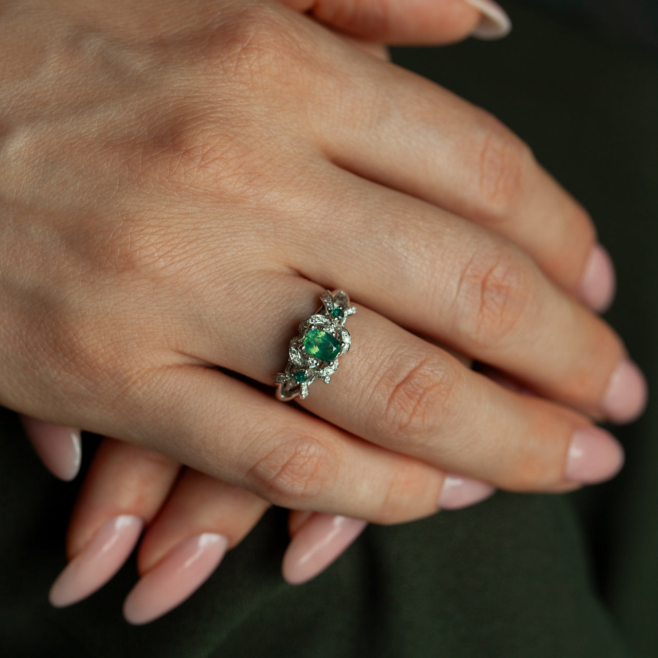 0.65ct natural alexandrite ring with diamonds in 18k white gold on hand