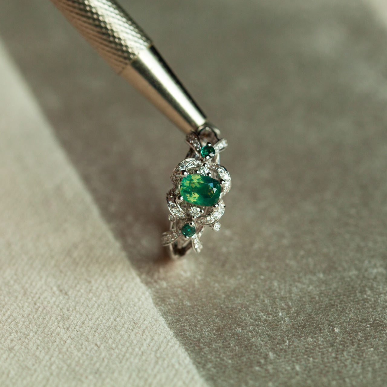 0.65ct natural alexandrite ring in 18k white gold with diamonds and accent alexandrites