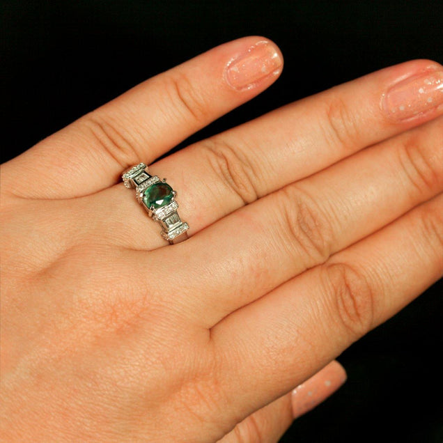 A woman's hand adorned with a 1.30ctw Alexandrite ring in 18k gold