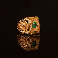 Thumbnail for 18k yellow gold men's signet ring with a 0.64ct natural emerald on a black backdrop