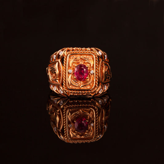 Close-up of 18k rose gold signet ring featuring a 0.94ct natural ruby