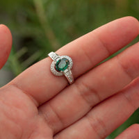 Thumbnail for A hand showcasing an 18k gold ring with a 1.00ct natural alexandrite stone