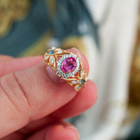 Thumbnail for Close-up of a 0.74ct pink sapphire and alexandrite accented ring in an 18k gold setting