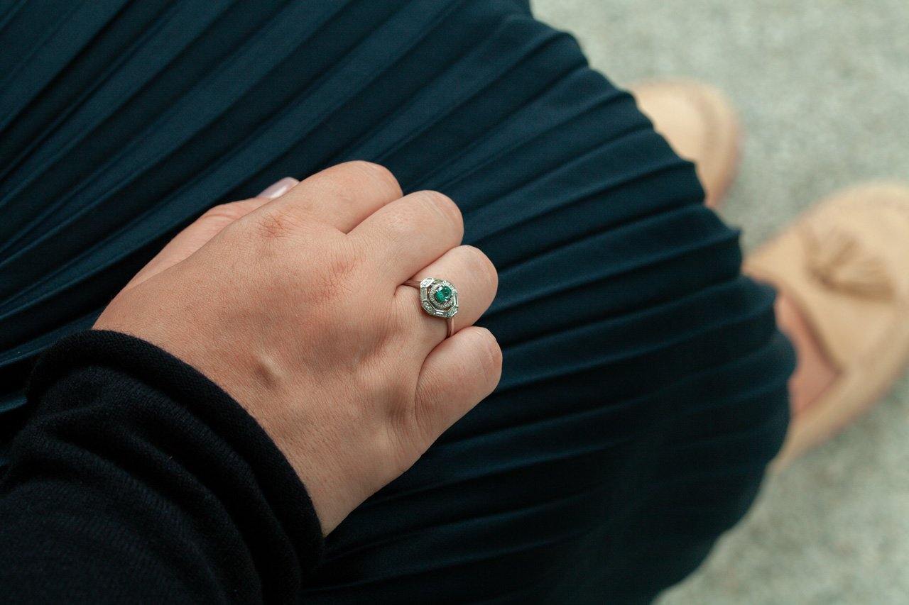 A woman's hand displaying a 0.60ct natural alexandrite ring set in platinum