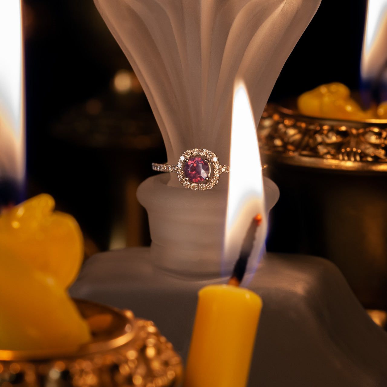 Elegant 0.45ct alexandrite ring with diamond halo in 18k white gold setting