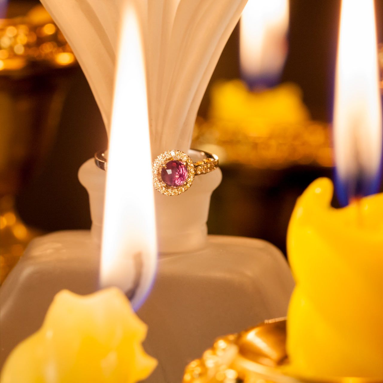 18k white and yellow gold ring featuring a 0.56ct natural alexandrite on a candle