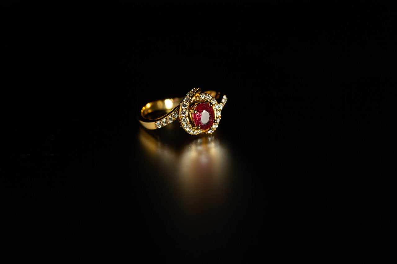 18k yellow gold ring featuring a 0.54ct natural unheated ruby