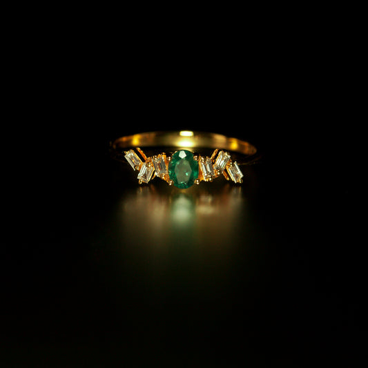 An 18K yellow gold stackable ring featuring a 0.33ct natural Alexandrite stone