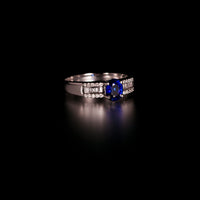 Thumbnail for 0.93ct blue sapphire ring with diamond accents displayed on a dark surface