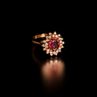 Thumbnail for An elegant 1.28ct pink sapphire ring flanked by diamonds in an 18k yellow gold setting